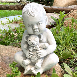 Скульптура  Ребенок с игрушкой